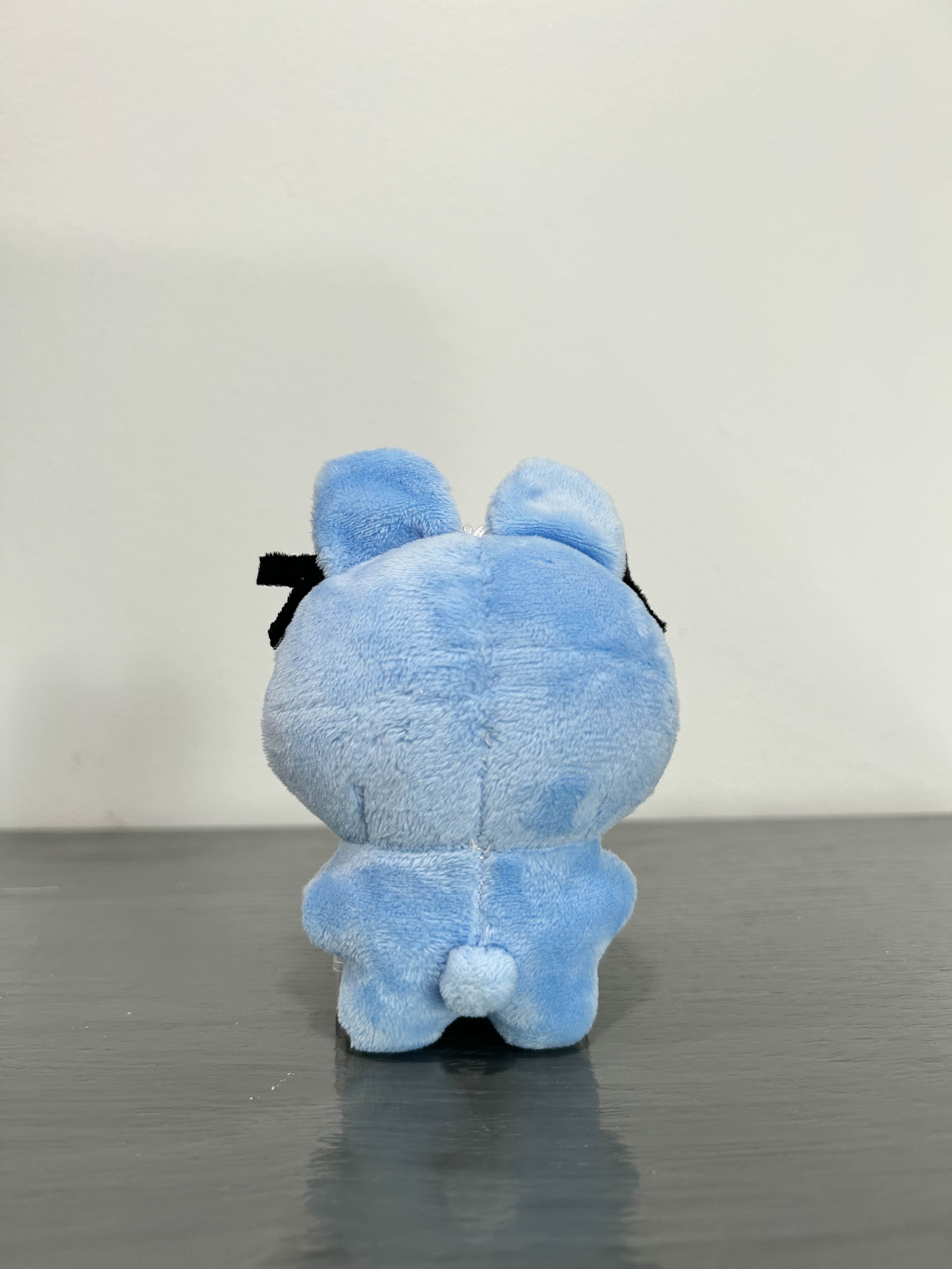 Blue bunny facing back