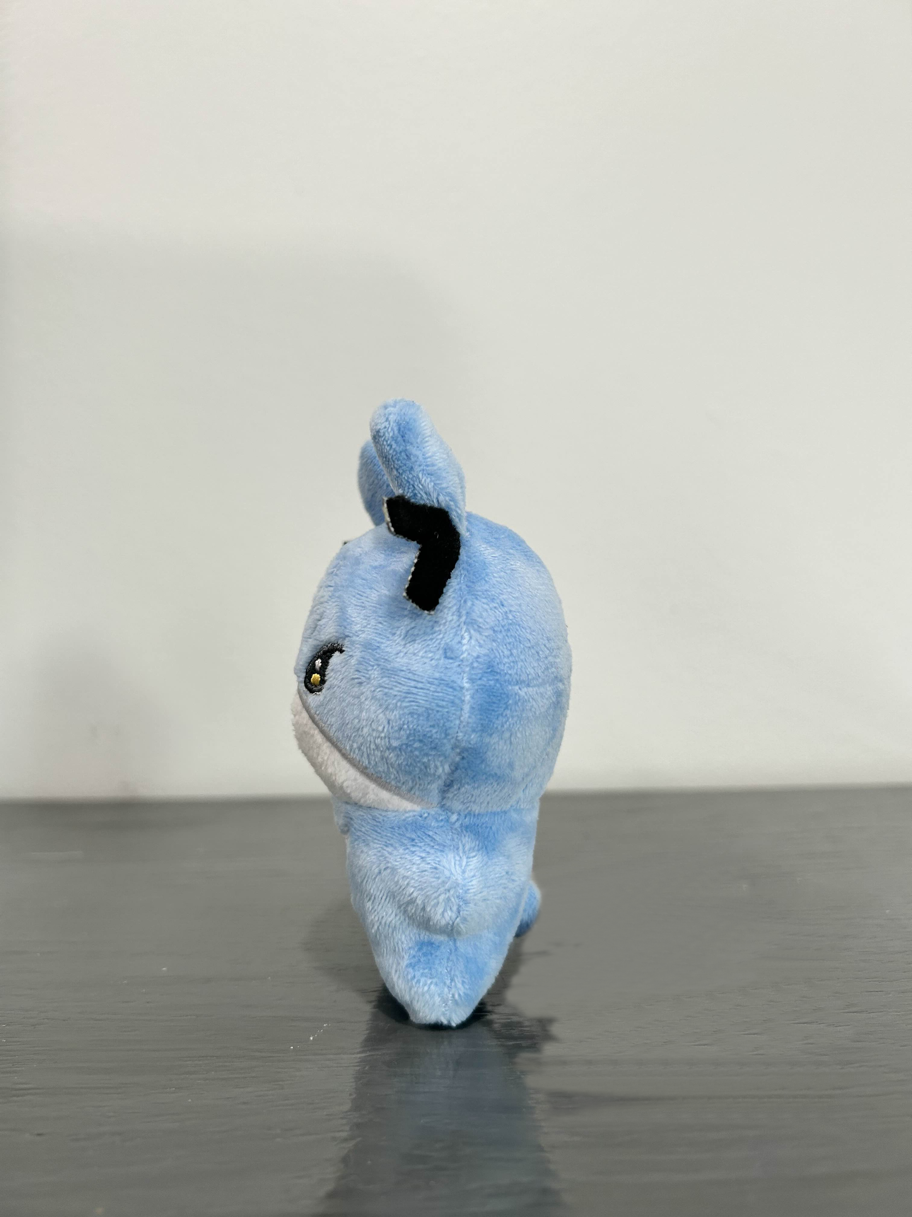Blue bunny facing side